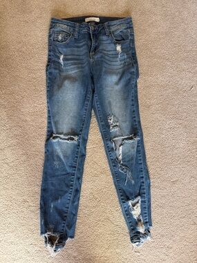 Classic Distressed Women’s Blue Jeans